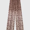 Pantaloni oversize con coulisse e stampa serpente Pantaloni oversize con coulisse e stampa serpente
