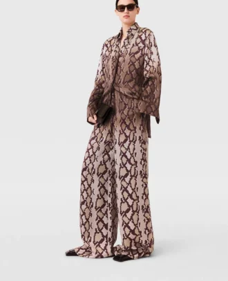 Pantaloni oversize con coulisse e stampa serpente