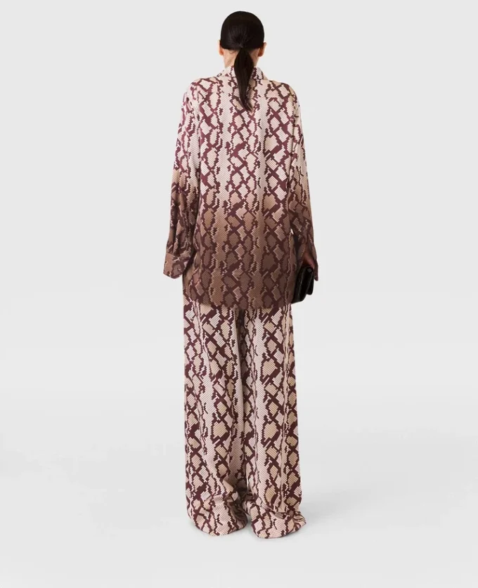 Pantaloni oversize con coulisse e stampa serpente Pantaloni oversize con coulisse e stampa serpente
