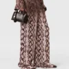 Pantaloni oversize con coulisse e stampa serpente Pantaloni oversize con coulisse e stampa serpente