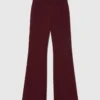 Pantaloni svasati in maglia compatta Pantaloni svasati in maglia compatta