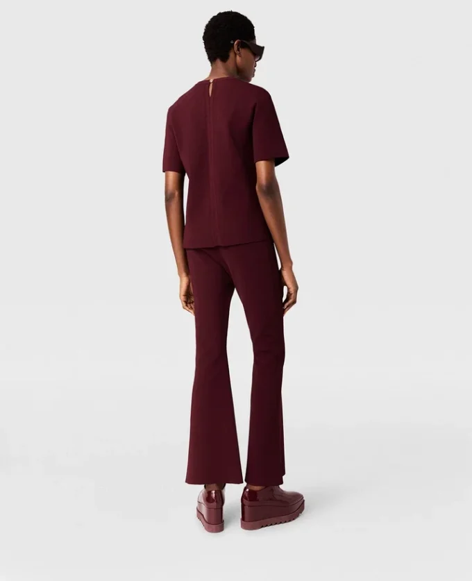 Pantaloni svasati in maglia compatta Pantaloni svasati in maglia compatta