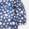 Piumino con cappuccio e stampa a stelle