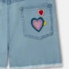Salopette in denim con ricamo “I Love You” Salopette in denim con ricamo “I Love You”