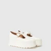Scarpe Mary Jane con plateau e cinturino a T Elyse Scarpe Mary Jane con plateau e cinturino a T Elyse