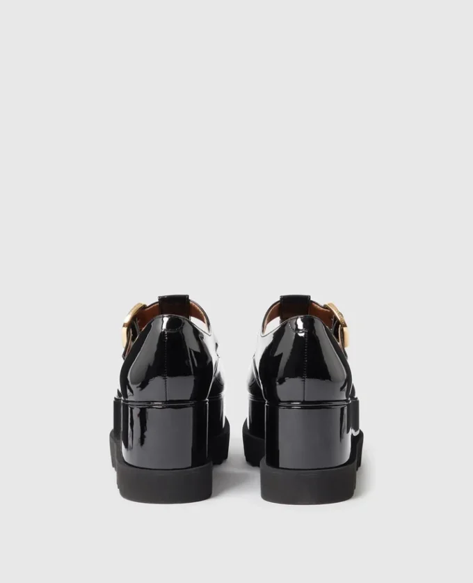 Scarpe Mary Jane con plateau e cinturino a T Elyse Scarpe Mary Jane con plateau e cinturino a T Elyse