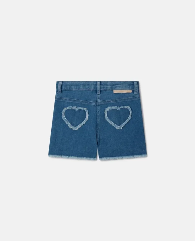 Shorts in denim elasticizzato con toppa a forma di cuore con frange Shorts in denim elasticizzato con toppa a forma di cuore con frange