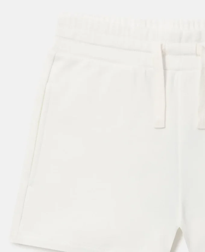 Shorts in jersey ricamato