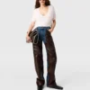 T-shirt girocollo in maglia semitrasparente T-shirt girocollo in maglia semitrasparente