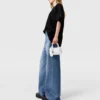 Jeans in denim a vita alta con gamba larga sbiadita Jeans in denim a vita alta con gamba larga sbiadita