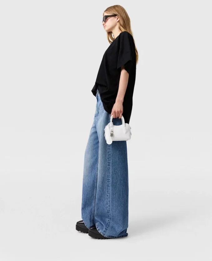 Jeans in denim a vita alta con gamba larga sbiadita Jeans in denim a vita alta con gamba larga sbiadita
