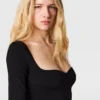 Top a maniche lunghe in maglia compatta Top a maniche lunghe in maglia compatta