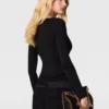 Top a maniche lunghe in maglia compatta Top a maniche lunghe in maglia compatta