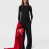 Top a maniche lunghe in maglia compatta Top a maniche lunghe in maglia compatta
