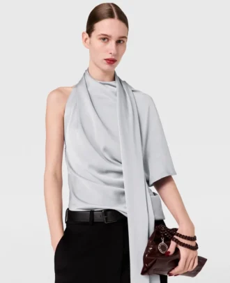 Top asimmetrico con collo annodato