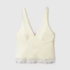 Top con scollo a V e bordi in pizzo Top con scollo a V e bordi in pizzo