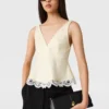 Top con scollo a V e bordi in pizzo Top con scollo a V e bordi in pizzo