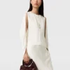 Top in raso con maniche a mantella e cut-out Top in raso con maniche a mantella e cut-out