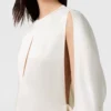 Top in raso con maniche a mantella e cut-out Top in raso con maniche a mantella e cut-out