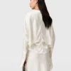 Top in raso con maniche a mantella e cut-out Top in raso con maniche a mantella e cut-out
