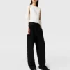 Top in raso con maniche a mantella e cut-out Top in raso con maniche a mantella e cut-out