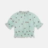 Top Ladybird a maniche corte con bordi plissettati Top Ladybird a maniche corte con bordi plissettati