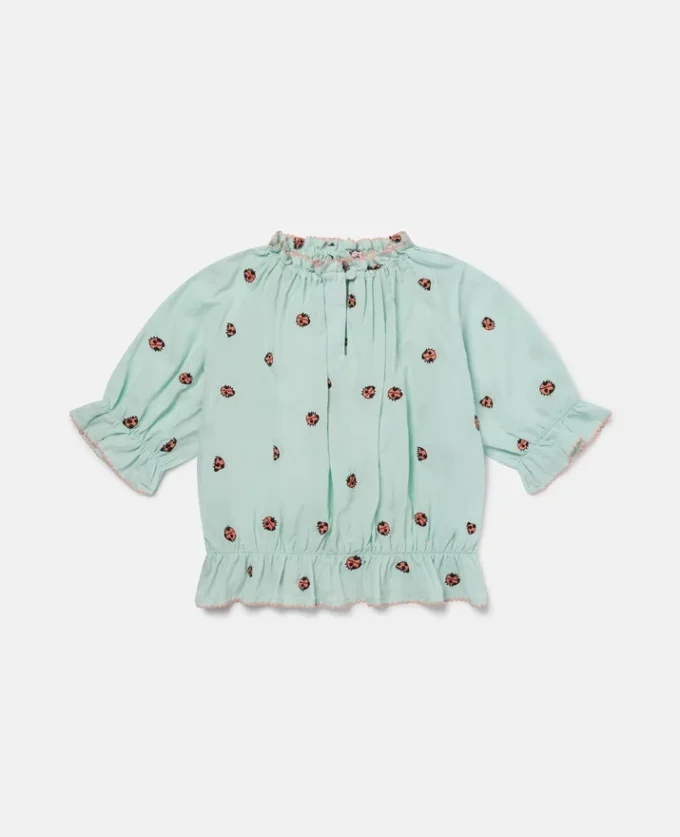 Top Ladybird a maniche corte con bordi plissettati Top Ladybird a maniche corte con bordi plissettati