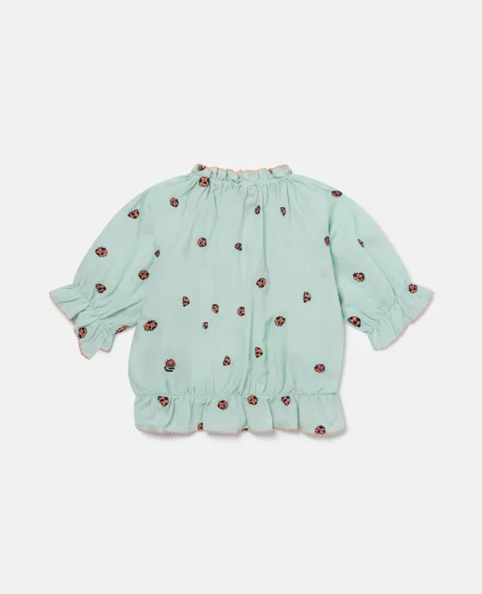 Top Ladybird a maniche corte con bordi plissettati Top Ladybird a maniche corte con bordi plissettati