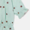 Top Ladybird a maniche corte con bordi plissettati Top Ladybird a maniche corte con bordi plissettati